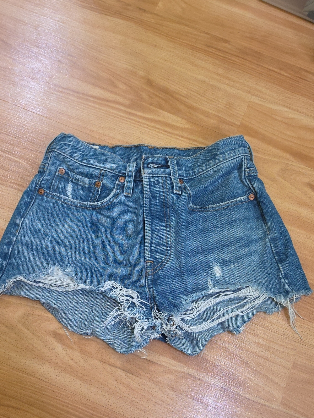 Levi's 501 Distressed Light Blue Denim Shorts